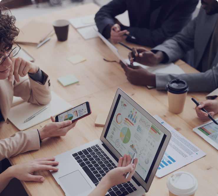 team at computer looking at marketing for home services